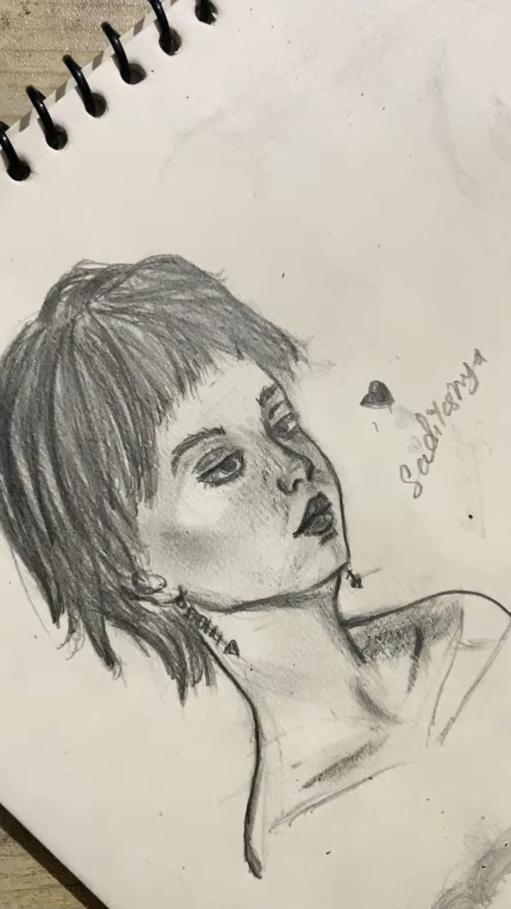 Pencil portrait study in profile, signed Sadikshya on the sketchbook page
